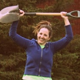 Girl running with shovel