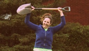 Girl running with shovel