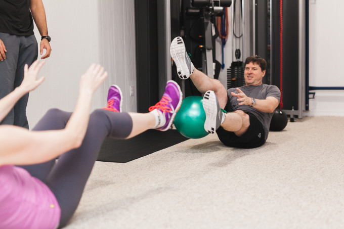 Scott working on his core. The old “around-the-leg-toss-with-your-legs-up-in-the-air” exercise.